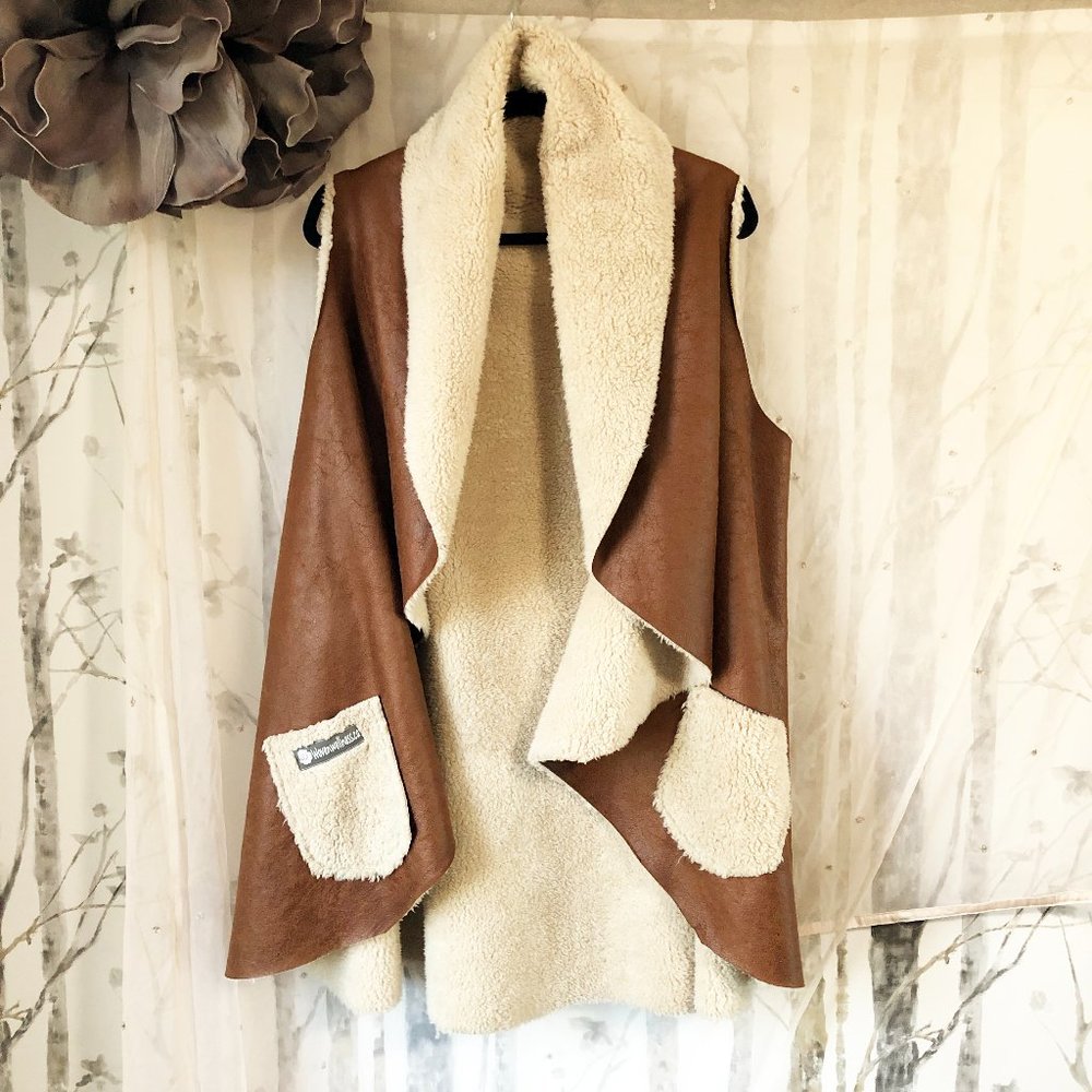 Woven Wellness sleeveless, open waterfall front vest